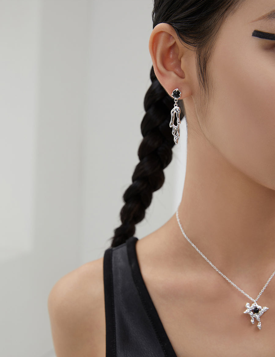 Turbolically asymmetric earrings